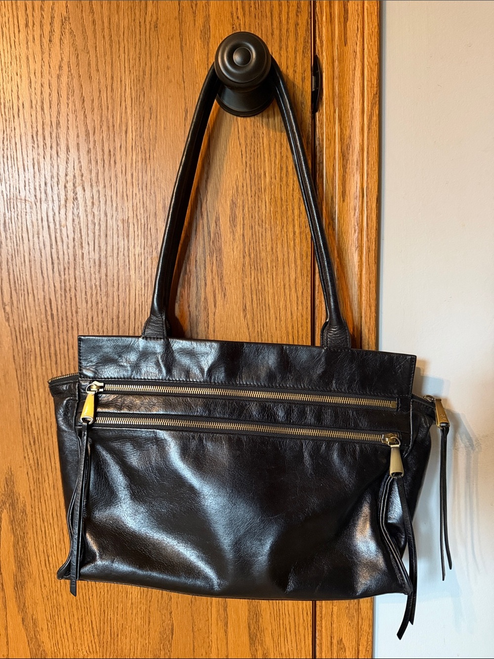 HOBO Black Leather Shoulder Bag with Gold Zippers